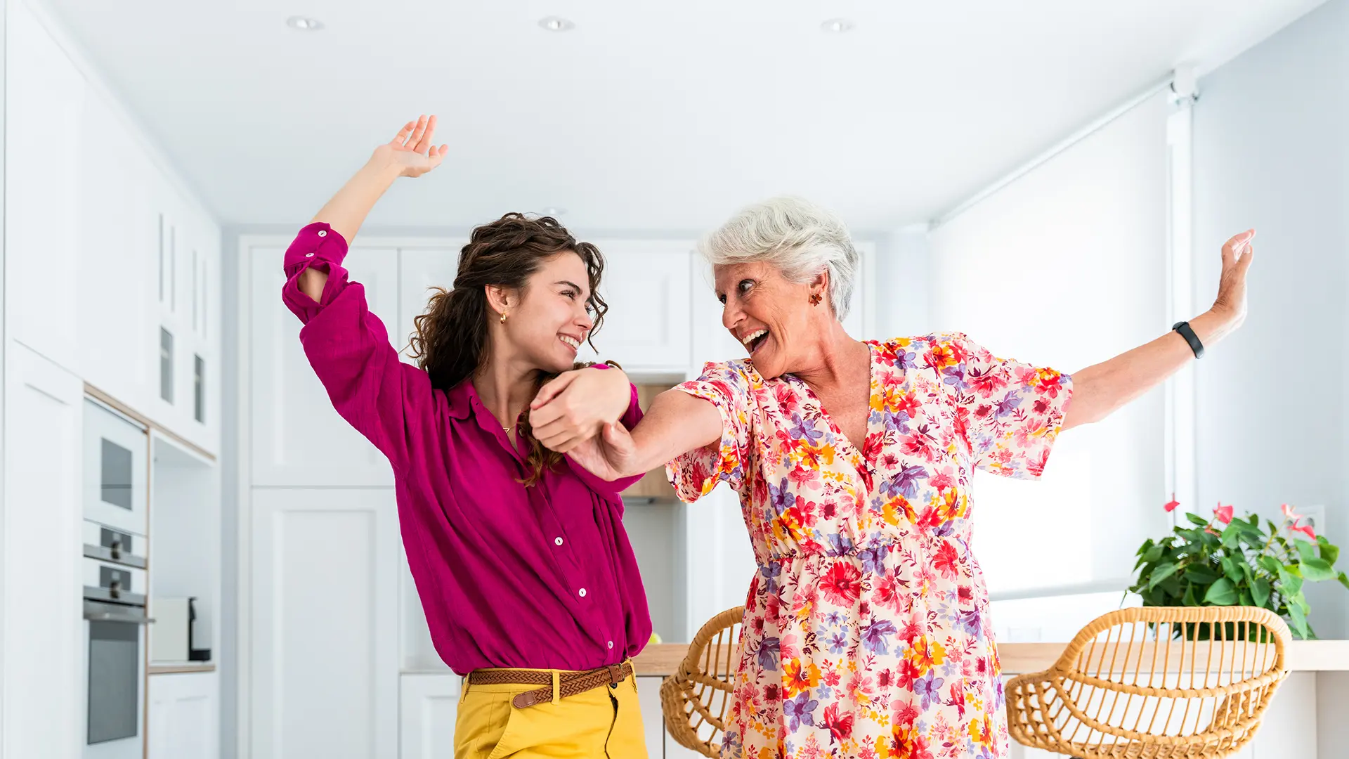 Grandma Dancing And Smiling With Daughter