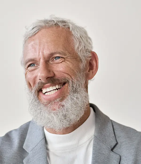 Middle Aged Man Smiling With New Teeth